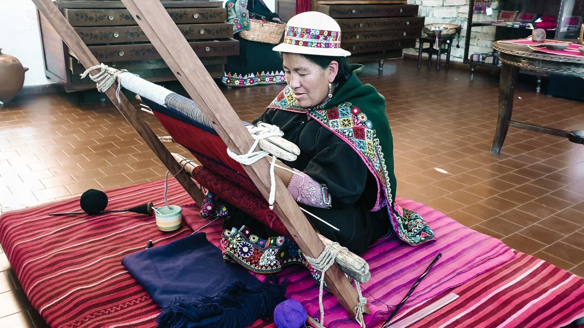 Indigenous women weaving.