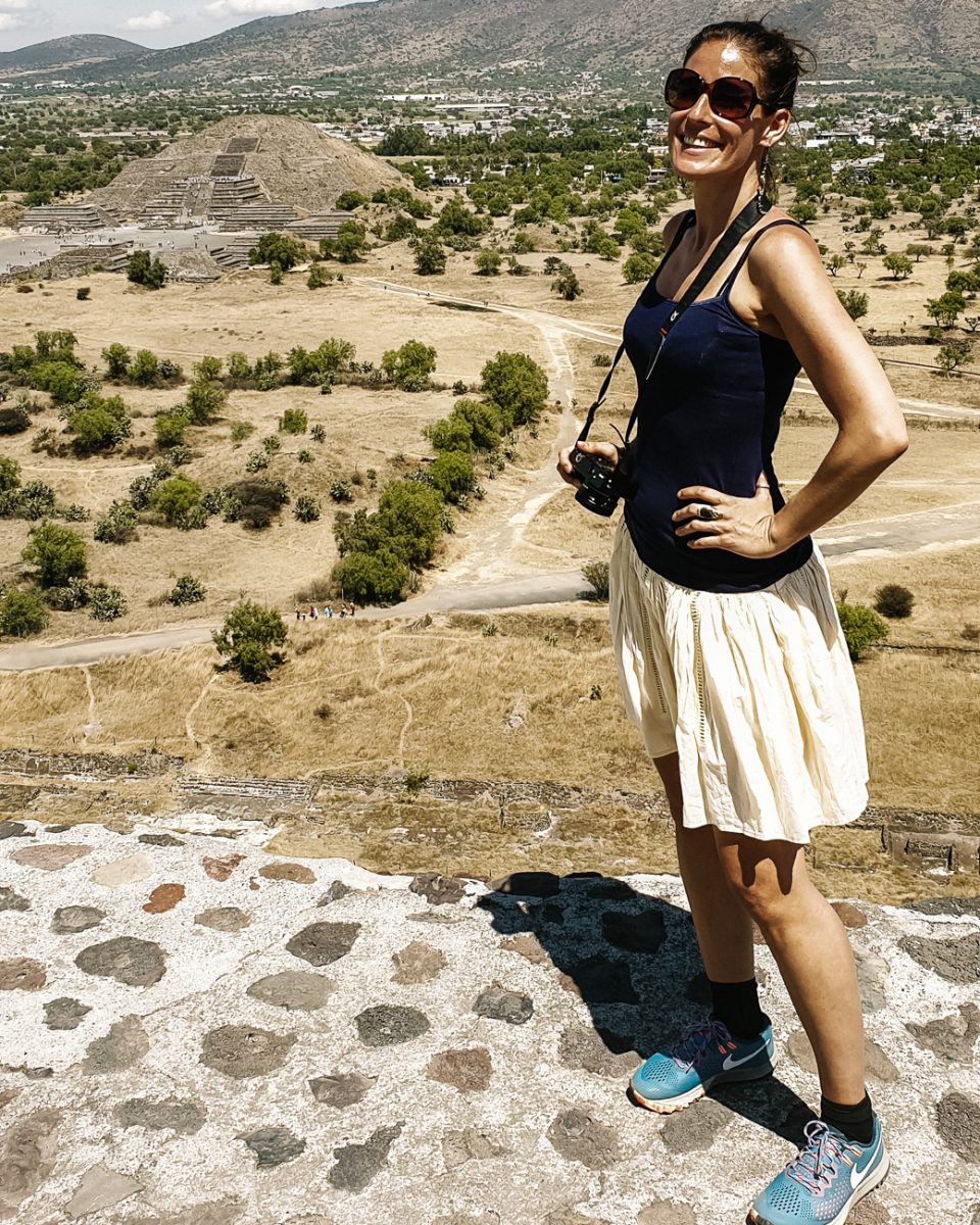 Deborah at pyramid in Teotihuacan, one of my tips for the best cultural things to do in Mexico if you are interested in history.