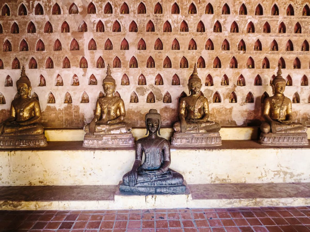 Wat Si Saket, is one of the oldest temples and best things to do in in Vientiane Laos. There are 2,000 Buddha sculptures displayed in a covered walkway around the temple. 