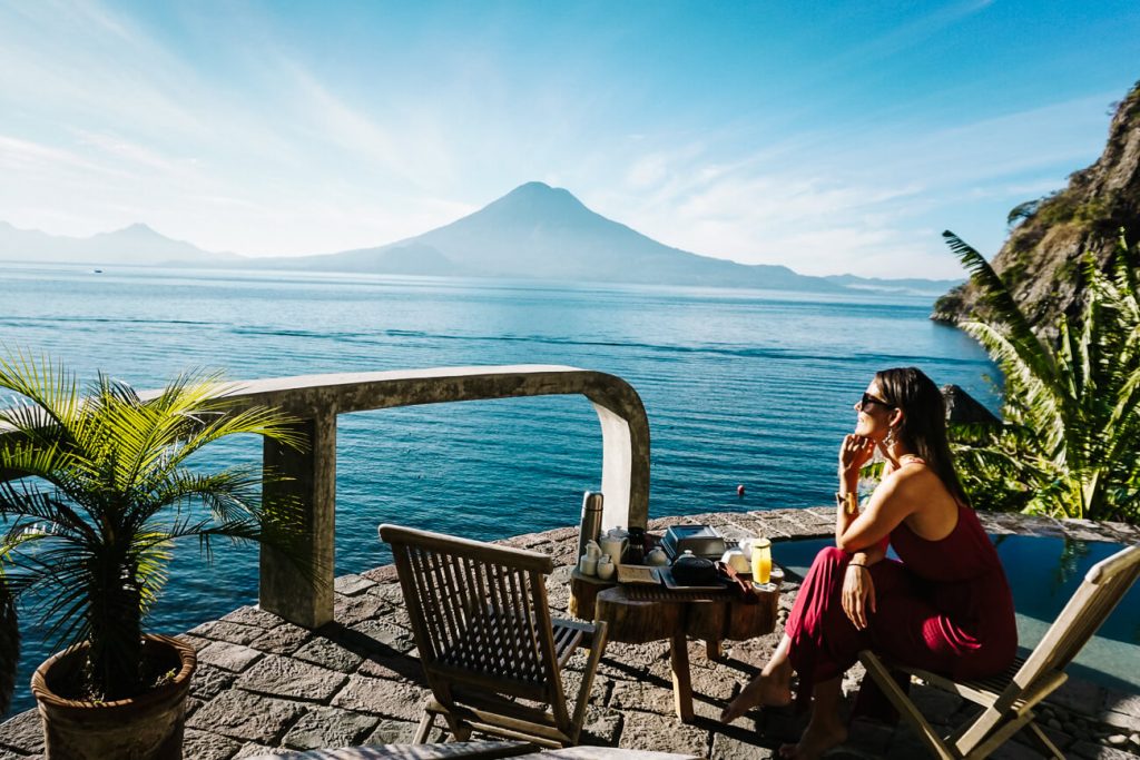 woman looking over lake from La Fortuna | one of the best things to do at lake atitlan