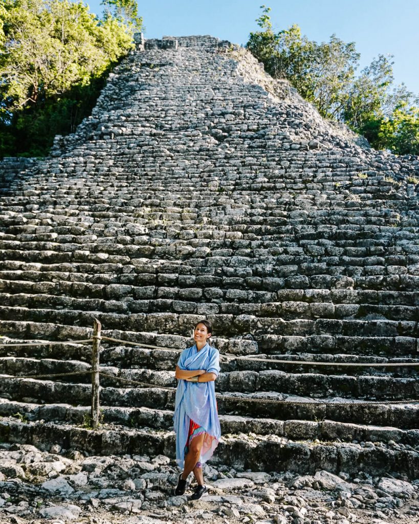 Deborah in front of pyramid at Cobá, one of the Maya ruins in Yucatan Mexico.