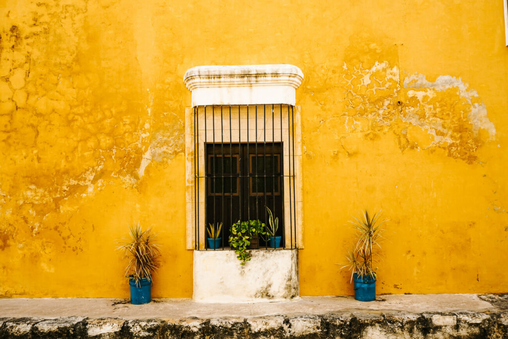 Yellow building in Izamal, worth including in your Mexico itinerary for 3 weeks.