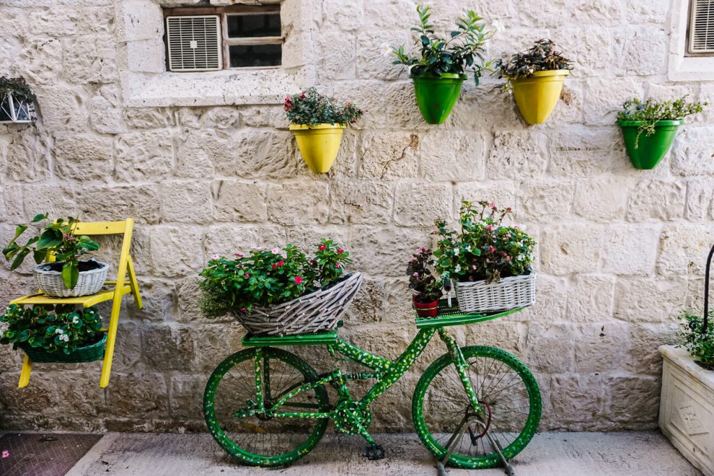 bike with flowers in streets of Vis, along the Dalmatian coast of Croatia