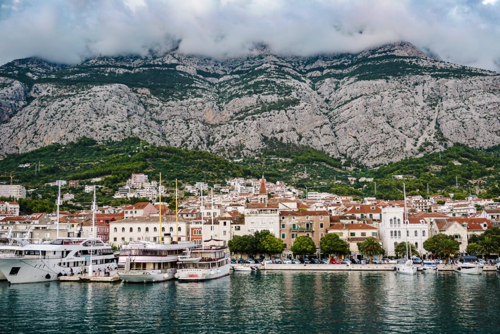 Makarska a pretty town at the foot of the Biokovo Mountain range along the Dalmatian coast. During your tour with the Sail Croatia cruise, you’ll arrive at the end of the afternoon as it’s your first day of sailing coming from Split.  And you have all evening to explore the town because the departure time is not until the next morning.