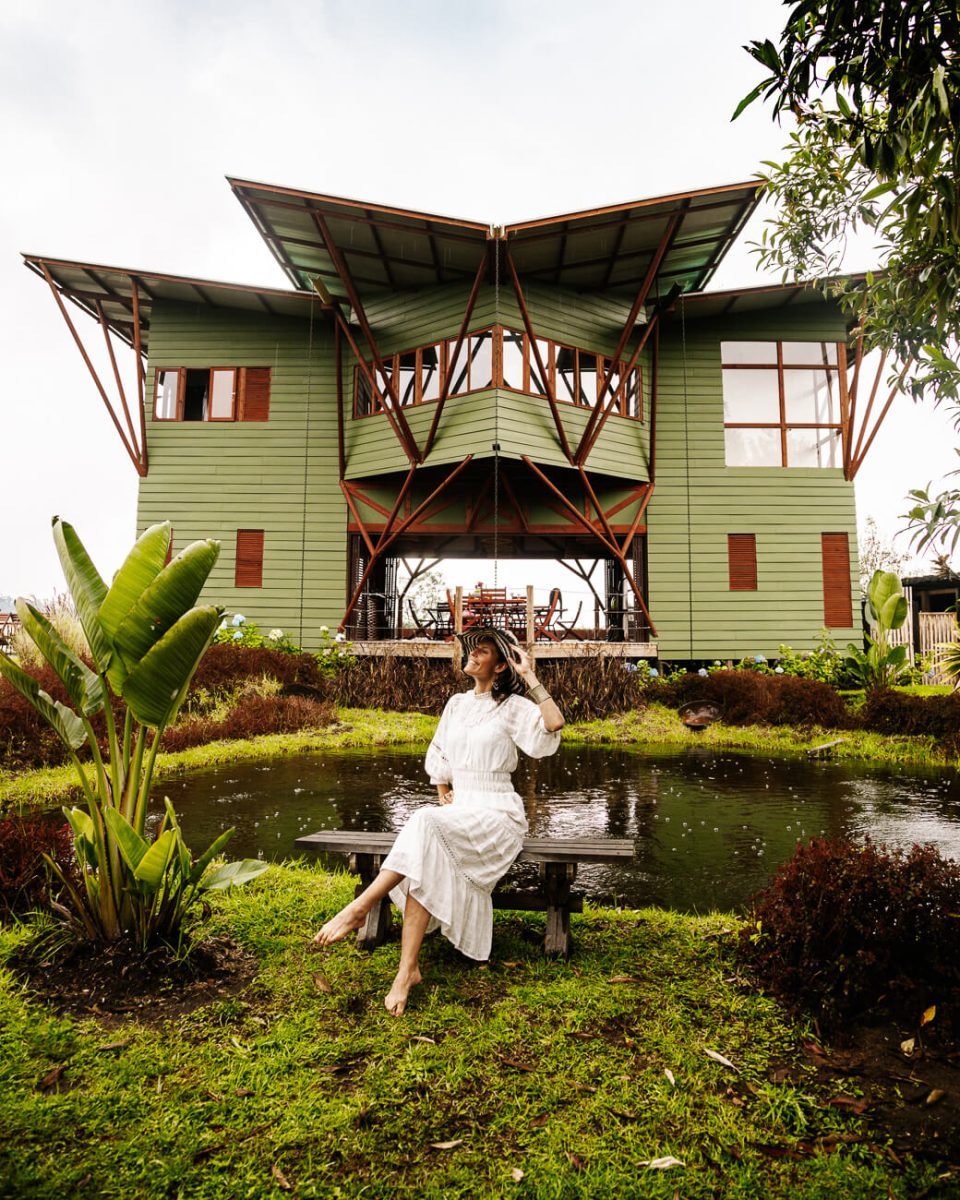 deborah in restaurant surrounded by greenery in El nido del condor Colombia