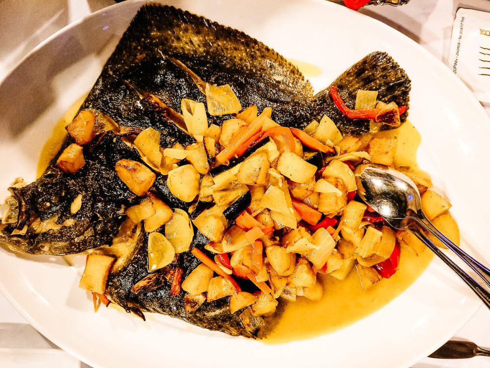 fish course in restaurant Corrado