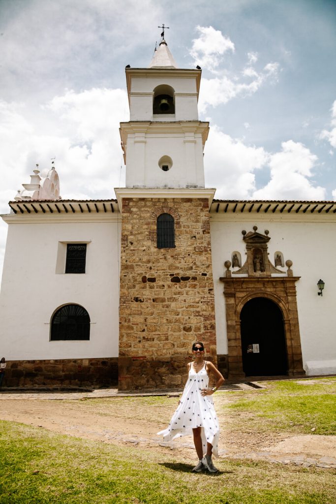 Deborah in front of Museo del Carmen in Villa de Leyva, Colombia