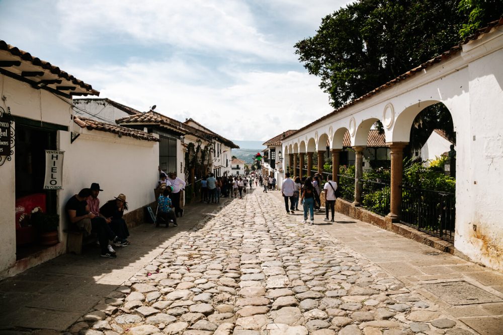 Main street of Villa de leyva in Colombia - one of the the best things to do is to stroll around the colonial city.

