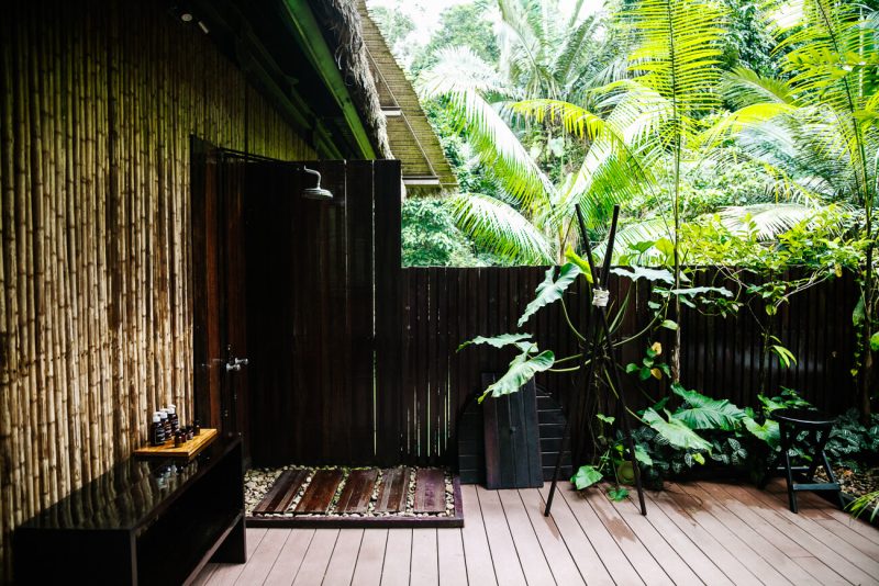 Terrace with outside shower at Tambopata Research Center - jungle lodge Peru by Rainforest Expeditions.