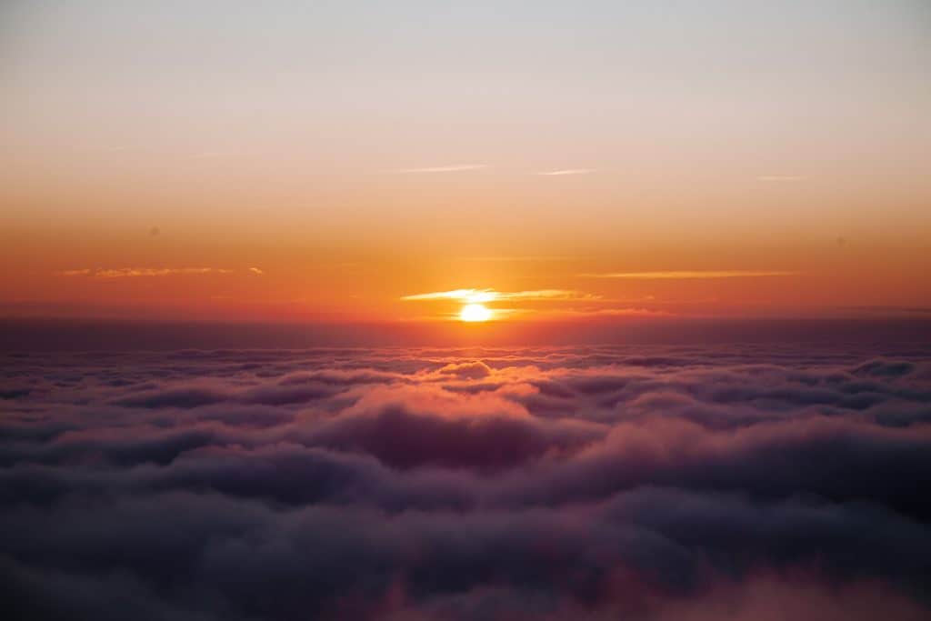 Sunset above the clouds.