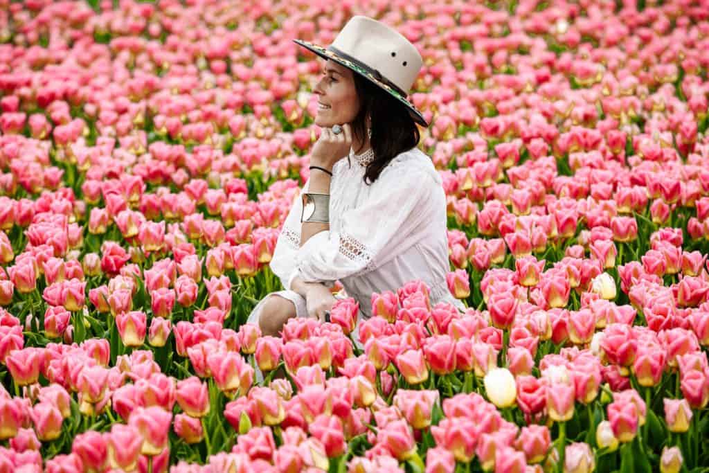 Deborah at the tulip fields in the countryside of Amsterdam.