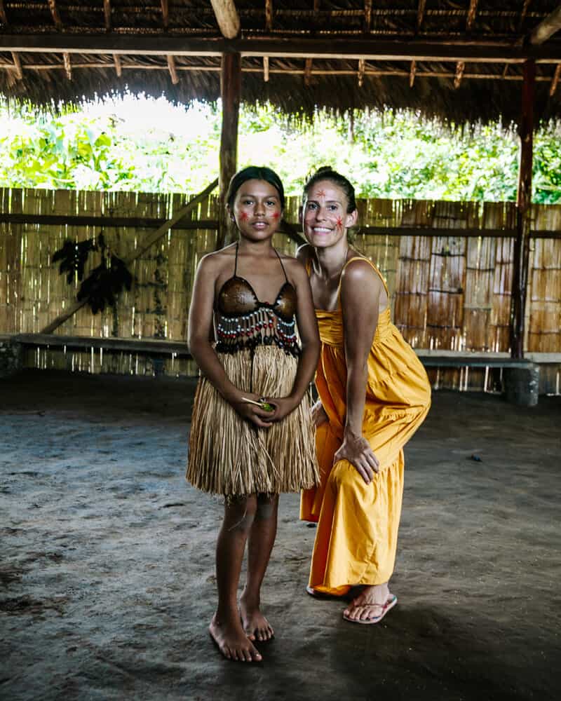 Deborah visiting local family along Rio Napo.