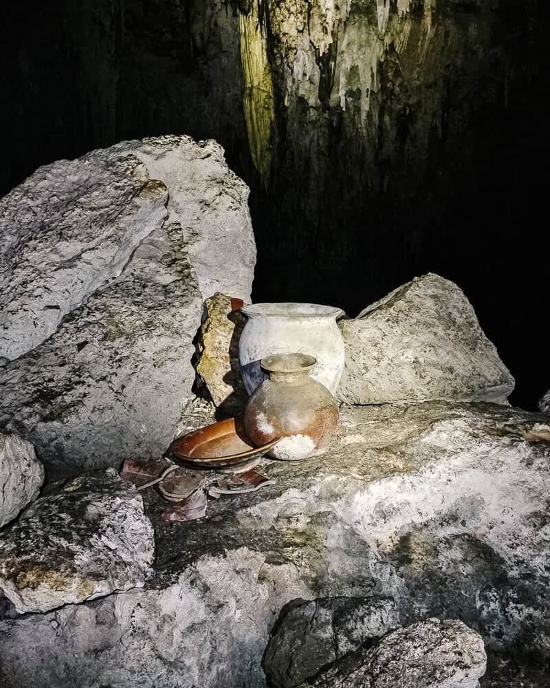 During a ceremonial cave visit, you will not only experience the beauty of the cave, but you will also walk past ancient Mayan artifacts and human remains dating back to 600 BC.