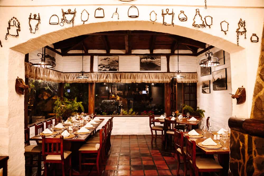 Hotel Hacienda Abraspungo in Riobamba has a large restaurant that is traditionally decorated. 