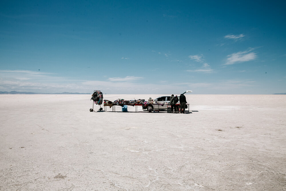 Stalls selling ponchos and other gadgets you can use for the your pictures on the salt flats.