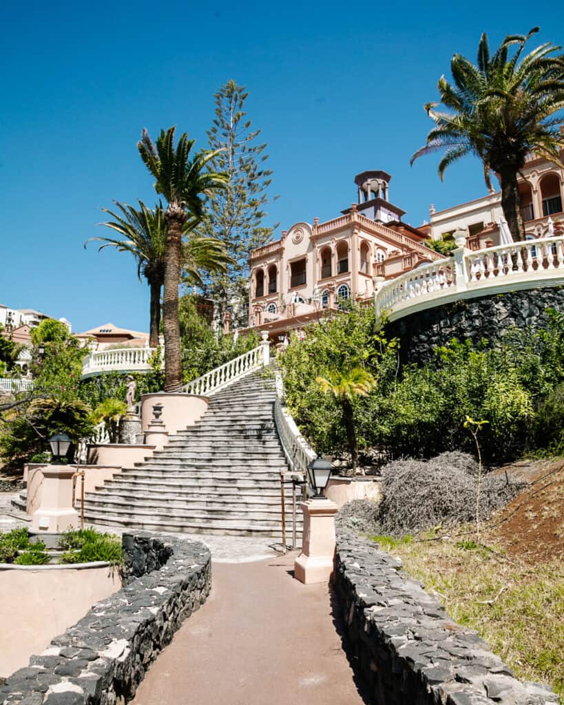 Gran Hotel Bahía del Duque is a luxurious fairytale hotel, located near Adeje, directly on the Atlantic Ocean with botanical gardens, swimming pools, high-end à la carte restaurants and nice rooms.