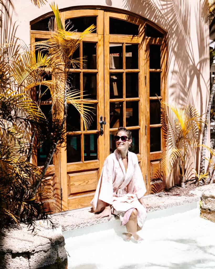 Deborah in tropical swimming pool.