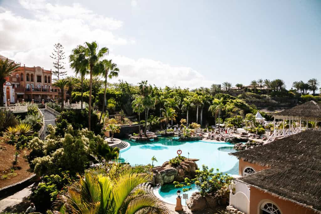 Gran Hotel Bahía del Duque is a luxurious fairytale hotel, located near Adeje, directly on the Atlantic Ocean with botanical gardens, swimming pools, high-end à la carte restaurants and nice rooms.