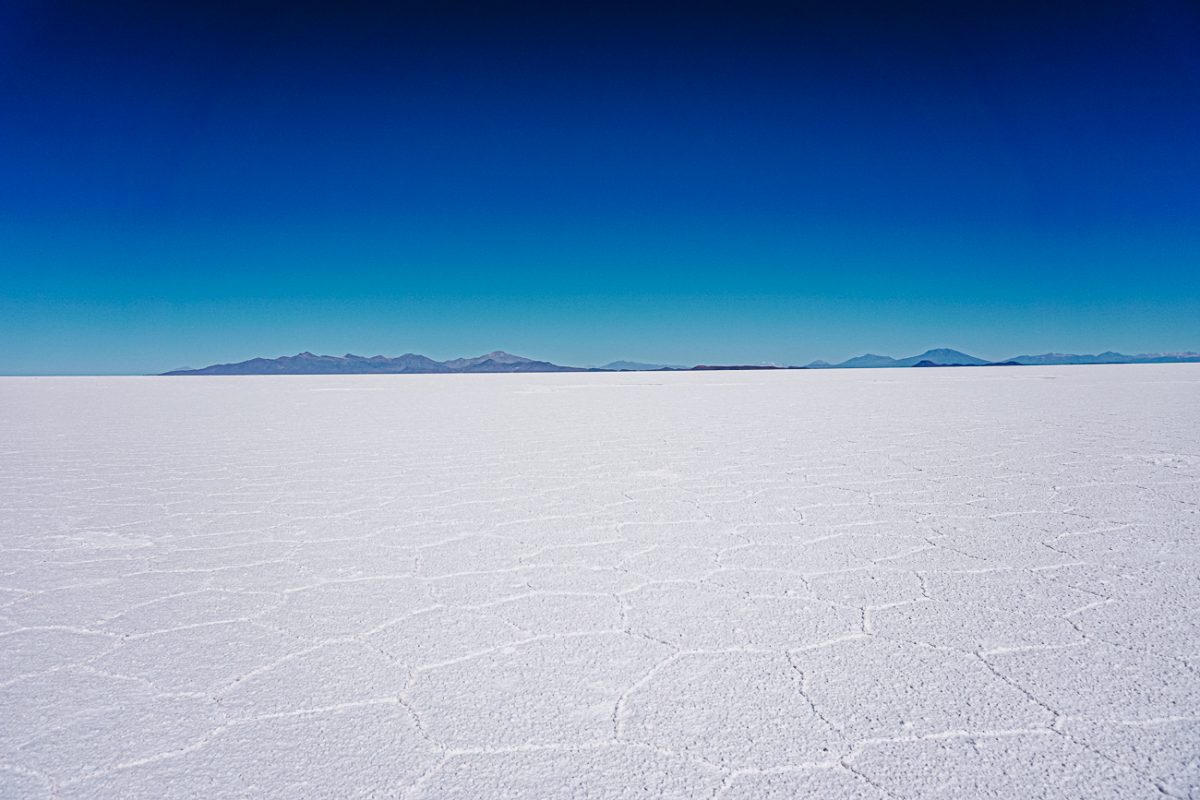 Everything you want to know about visiting Salar de Uyuni in Bolivia and the best insider tips for a salt flats day or multi-day tour. 
